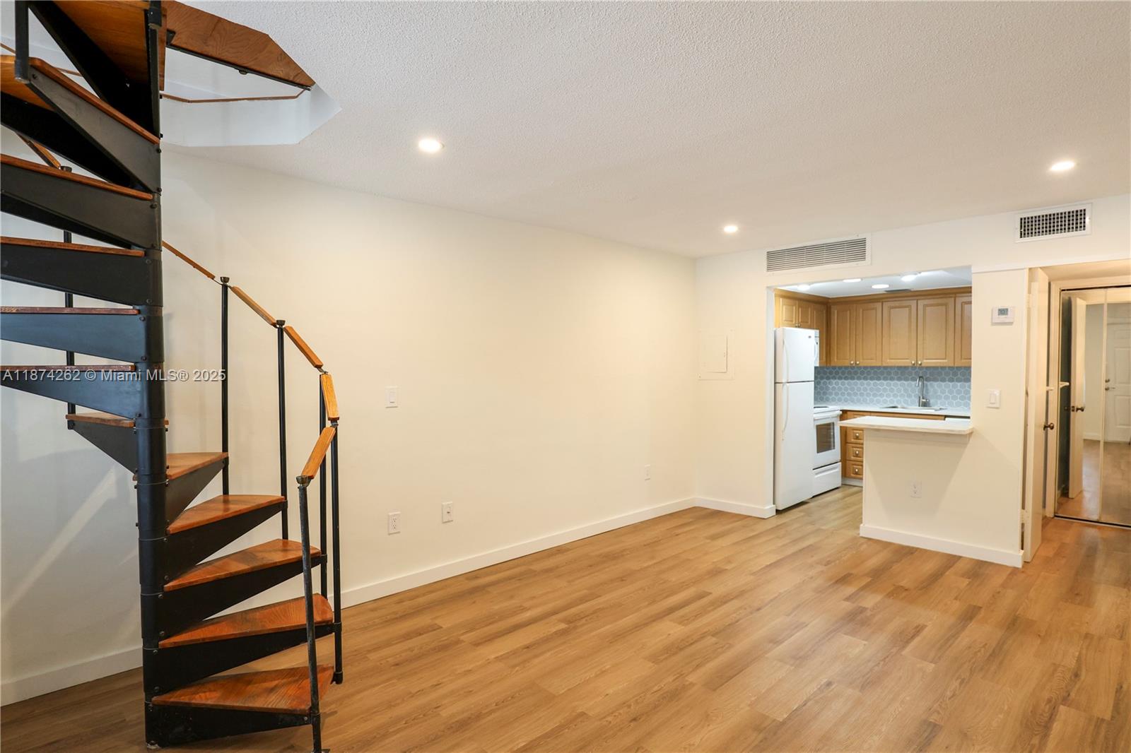 Nestled in the heart of Coconut Grove, this large 1 bedroom 1.5 bathroom unit offers a cozy retreat with a loft like feel. Spanning two stories and 700 square feet, the space fits all your living needs. Step out onto the balcony to savor the breeze. Enjoy a smaller building in a gated community with 1 parking space & guest parking. Minutes away from Coconut Grove's vibrant shops & entertainment, conveniently nearby Brickell and Coral Gables, enjoy comfortable living in a prime location.