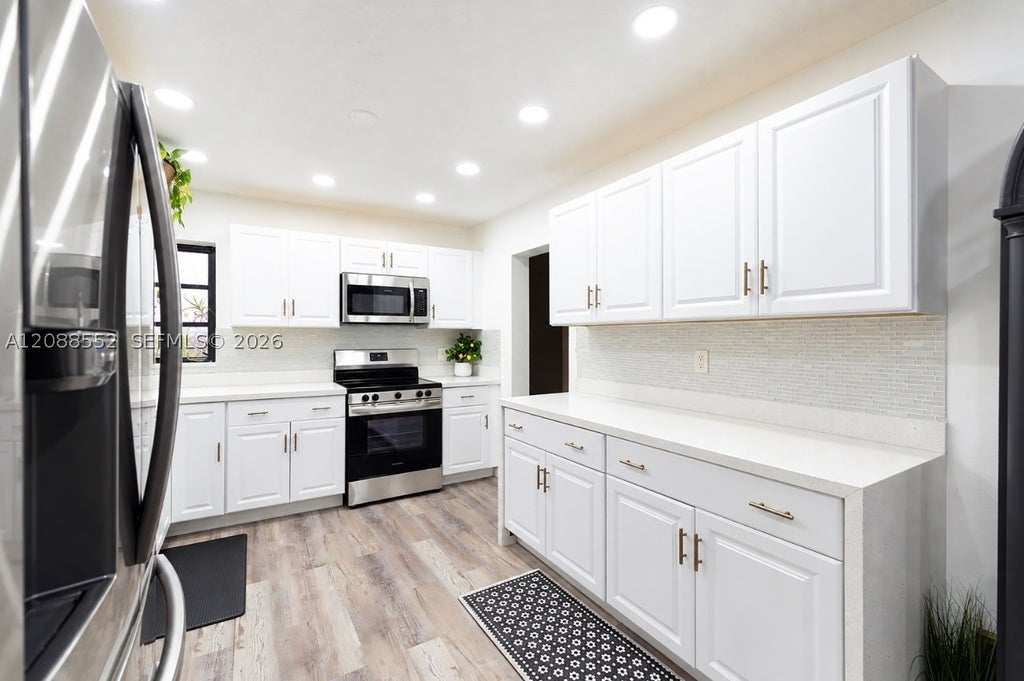 Photo of 7551 Polk St, Hollywood, FL 33024 (MLS # A12088552)