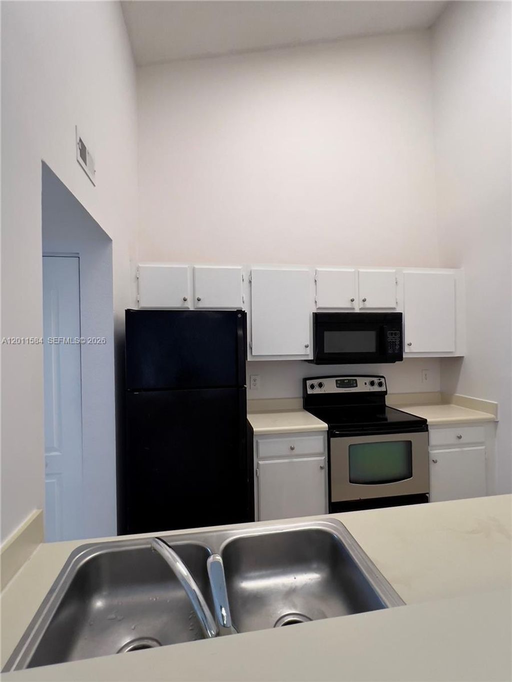 Photo of 2880 N Oakland Forest Dr #214, Oakland Park, FL 33309 (MLS # A12011584)