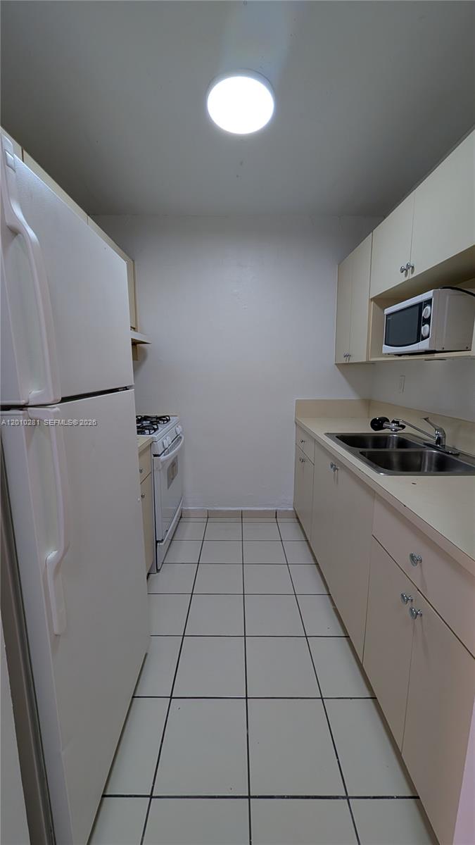 ROYAL PALM GARDENS CONDO - Residential