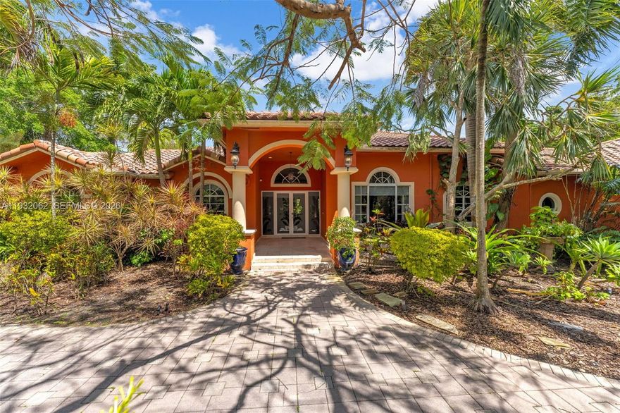 ELEGANT MEDITERRANEAN RESIDENCE ON A QUIET STREET IN THE HEART OF PINECREST. BUILT IN 1997, THIS HOME OFFERS 6BD/5.5BA SPLIT FLOOR PLAN THAT OFFERS PRIVACY AND FUNCTIONALITY, HIGH CEILINGS COMPLEMENTED BY AN EXPANSIVE FORMAL LIVING AND DINING AREAS FILLED WITH NATURAL LIGHT. THE GOURMET KITCHEN FEATURES GRANITE COUNTERTOPS, SS APPLIANCES,A CENTER ISLAND, ABUNDANT CABINETRY AND AN SPACIOUS DEN WITH A BUILT-IN BAR IDEAL FOR ENTERTAINING. ENJOY A RESORT STYLE POOL SURROUNDED BY LUSH TROPICAL MATURE TREES, PALM TREES AND AN INVISIBLE DOG FENCE CREATING A PRIVATE AND SERENE RETREAT. A RARE OPPORTUNITY FOR REFINED PINECREST LIVING.