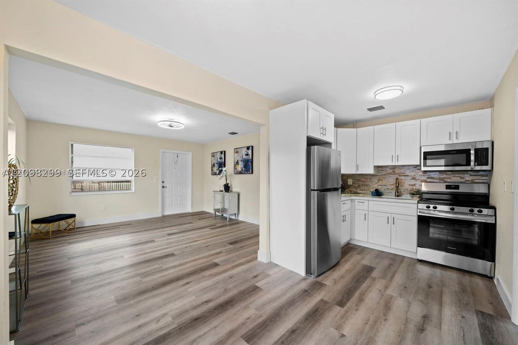 Photo of 7532 Farragut St, Hollywood, FL 33024 (MLS # A12098299)