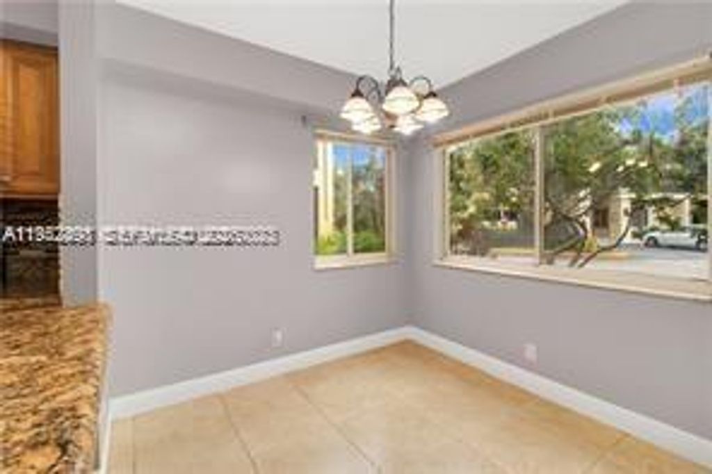 Photo of 5720 Rock Island Rd #383, Tamarac, FL 33319 (MLS # A11952498)