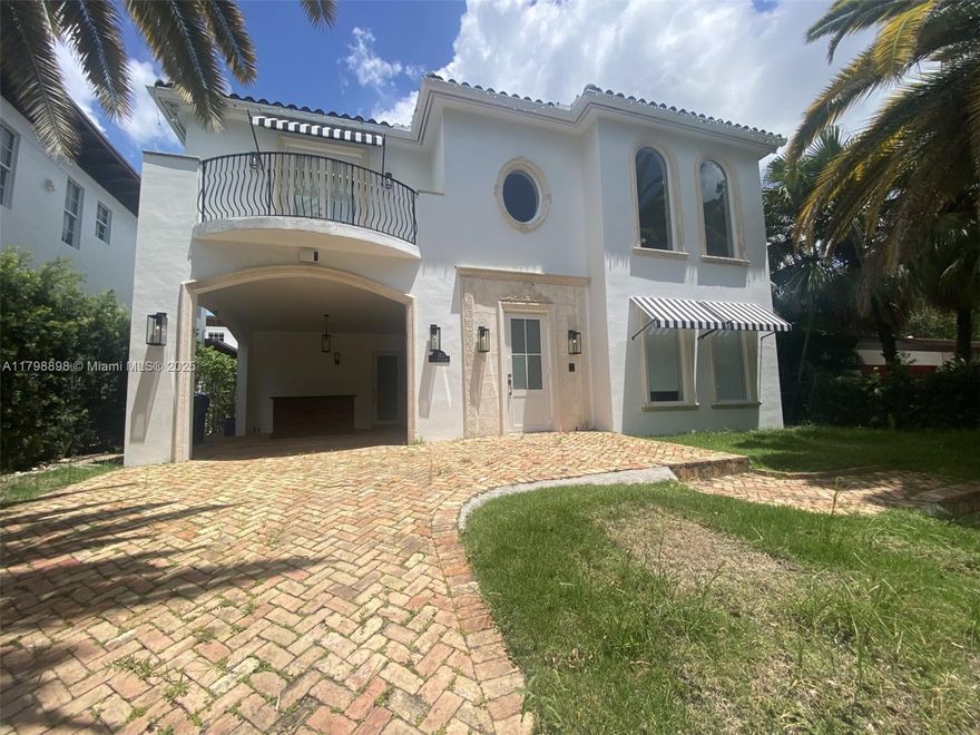 This executive home located right on South Miami Avenue features 5 bedrooms and 5.5 bathrooms, formal living room with vaulted ceilings allowing for natural light, open-concept family room with bar to effortlessly entertain family and guests, kitchen with high-end appliances ready for the chef of the house, master suite with its own balcony so you may enjoy your morning coffee, elegant bathrooms with modern fixtures, covered terrace overlooking the pool to easily bring the entertainment outdoors and impact windows for peace of mind. Centrally situated in close proximity to schools, shopping and fine dining.  See it ... love it... decorate it to make it your own!