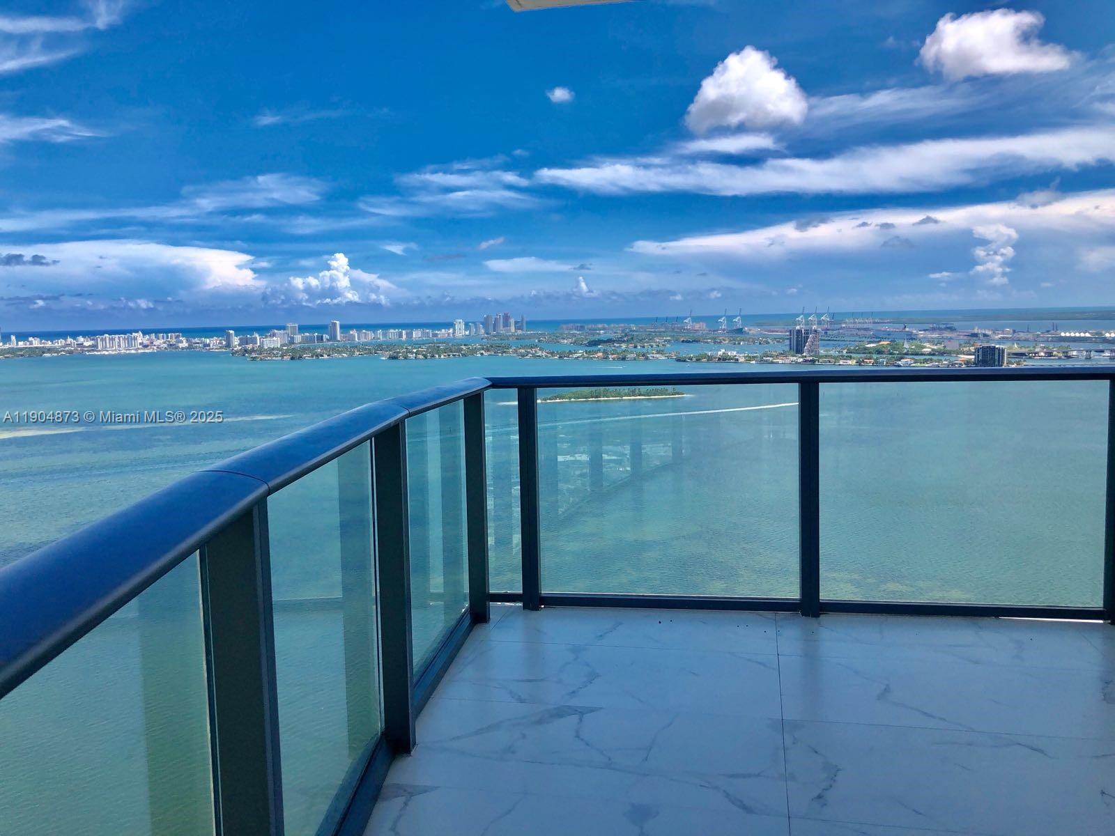 BRAND NEW 1 bed/2 bath + Den corner unit in Paraiso Bay with stunning water views from every angle High end finishes & upgrades. Den has a glass enclosure which easily can be used as a second bedroom/office/study room. Motorized window treatments, fully upgraded lighting ,built out closets & movable island. Bosch and Sub-Zero appliances. Luxurious 5 star amenities which include. State of the art Gym & Spa, Wine room, Cigar Lounge, Billiard Room, Movie theater, Children's playroom, Business Center,Lounge,100 diameter beach entry pool, Cabanas, Out doorgrill,2 tennis courts, Bayfront Park with docks and boardwalk. Access to private beach club only for residents. GREAT location minutes to the Beaches, Design District, Wynwood, Downtown and Brickell. 1assigned parking space
