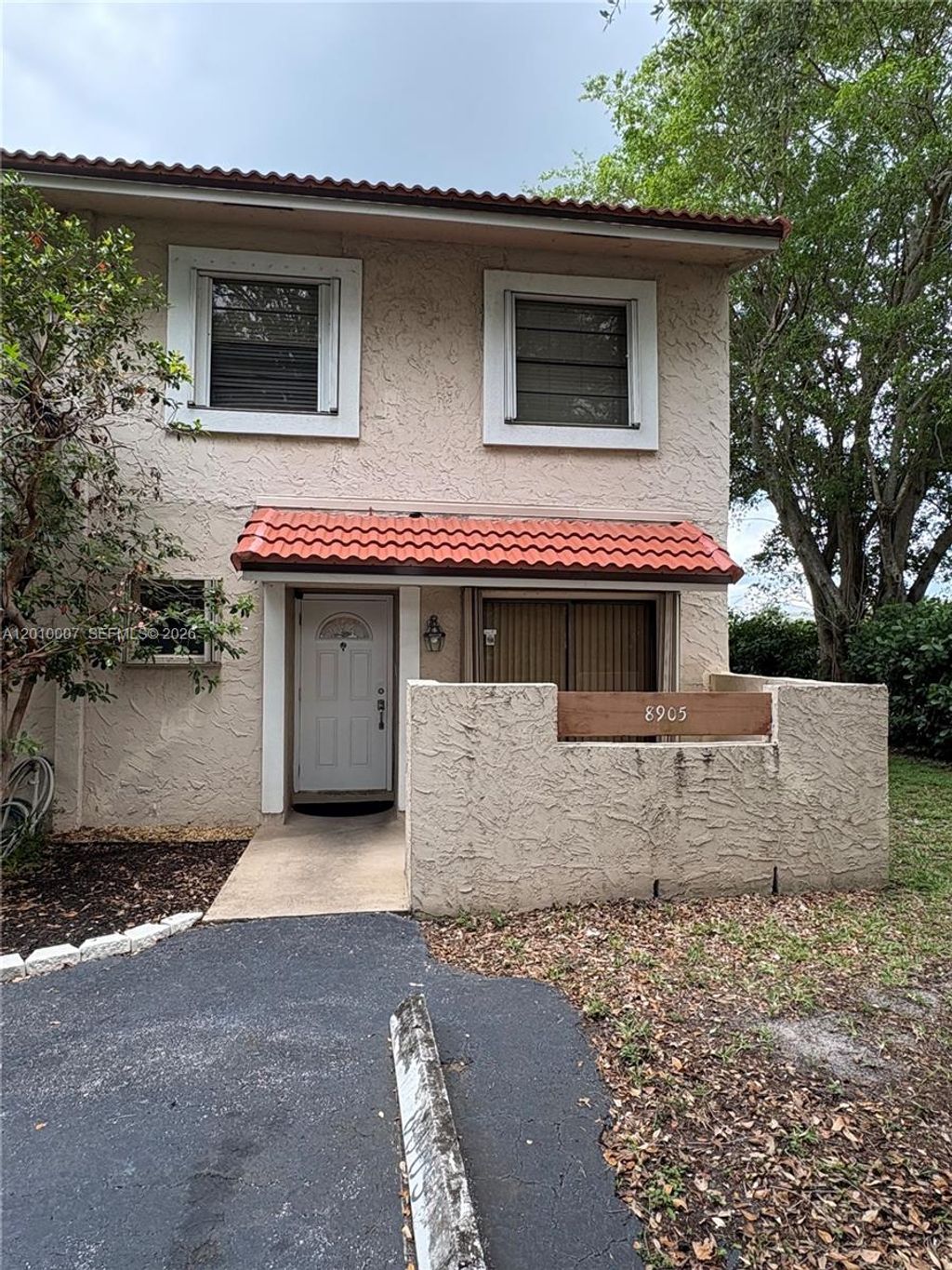 Photo of 8905 NW 38th Dr #4, Coral Springs, FL 33065 (MLS # A12010007)