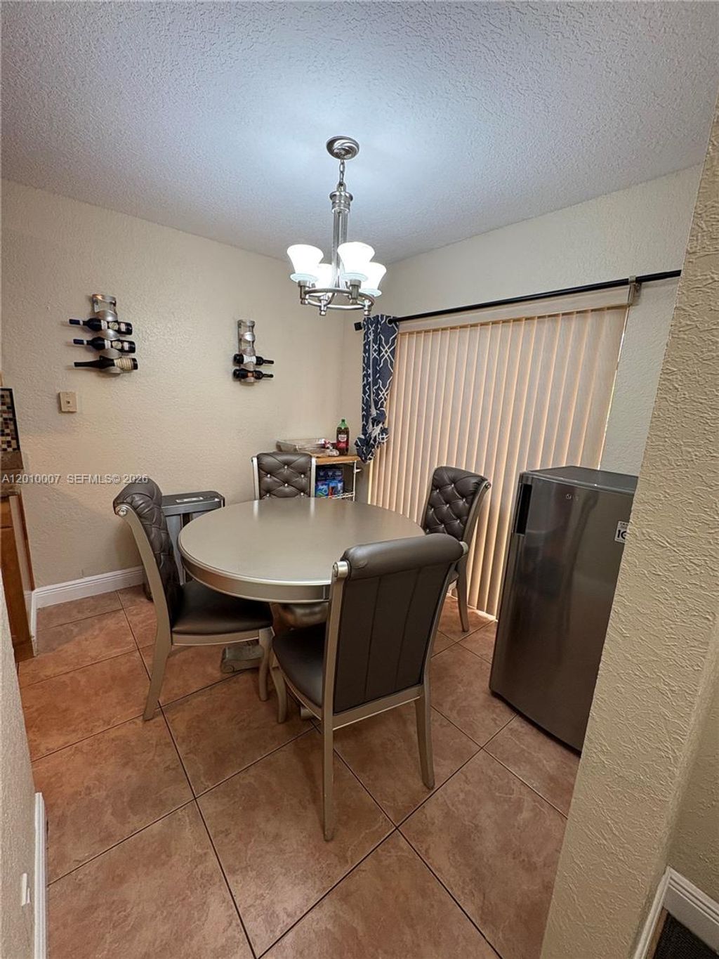 Photo of 8905 NW 38th Dr #4, Coral Springs, FL 33065 (MLS # A12010007)