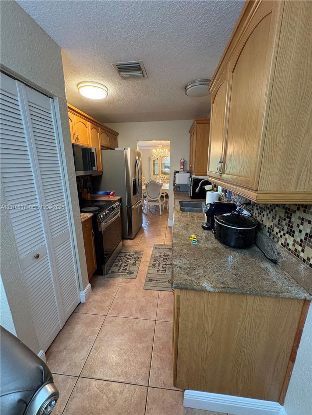 Photo of 8905 NW 38th Dr #4, Coral Springs, FL 33065 (MLS # A12010007)