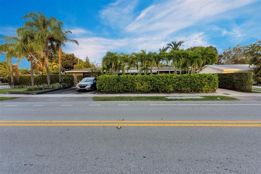 Great Investment Opportunity! This updated resort-like gem in highly coveted Coral Ridge & the Bayview School District features remodeled kitchens and baths, decorative ceiling treatments, & a 4-year-old roof. It boasts 2 elegant units: Unit 1 is a 3/3 with sitting and family rooms/ office, a serene, paved garden porch, & a patio; and Unit 2 is a 2/ 2 with a sitting and family rooms and patio & yard space. It's 3 driveways, park up to 8 cars. It sits on a huge lot on the corner of Middle River Dr. & a quiet tree-lined street of million-dollar+ homes, minutes from the beach, Coral Ridge Mall, great shopping, & restaurants. Given its ideal location and layout, it's ideal for year-round rentals or may possibly be rented out to 4 people on Airbnb. Present rents are substantially below market.