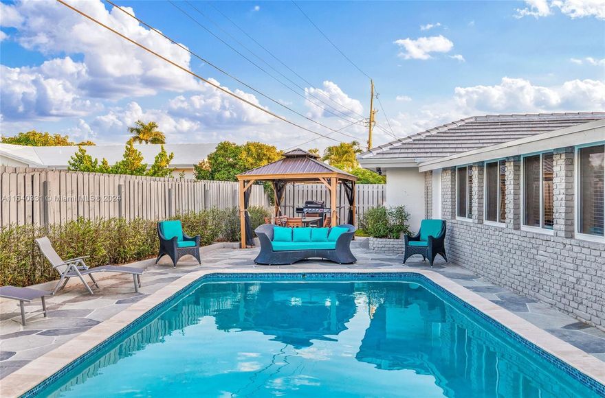 Discover your dream home in the coveted Imperial Point neighborhood, perfectly located near top-rated private schools, major shops, and exceptional restaurants. Just a 5-minute drive to the beach!
This stunning single-family house has been completely remodeled in 2021, boasting:
New roof and windows
Modern AC system
State-of-the-art pool equipment
Efficient sprinkler system
Tankless water heating system for endless warm showers
The interior features:
4 spacious bedrooms
3 totally remodeled bathrooms
Oversized swimming pool perfect for sun-kissed days
 Game room for endless entertainment
Big laundry room with washing sink.
Don't miss out on this incredible opportunity! Schedule a showing today!