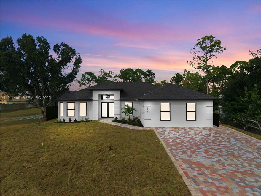 STUDIO! NEW CONSTRUCTION WITH LEGAL MOTHER-IN-LAW SUITE ATTACHED. YOU CAN RENT THE STUDIO FOR $1,200 PER MONTH AND LOWER YOUR MORTGAGE PAYMENT. BUYERS CAN QUALIFY USING THE FUTURE INCOME OF THE MOTHER-IN-LAW SUITE. 
Welcome to this stunning new construction home, thoughtfully designed for modern living and flexibility. Featuring 3 bedrooms + den, 2 bathrooms, and a fully equipped private in-law suite. High ceilings, quartz countertops, stainless steel appliances, impact-resistant windows, and doors. A spa-like Master bathroom with glass shower doors, a double vanity, and two walk-in closets. The studio features a full kitchen, washer and dryer, walk-in closet, and a modern bathroom.