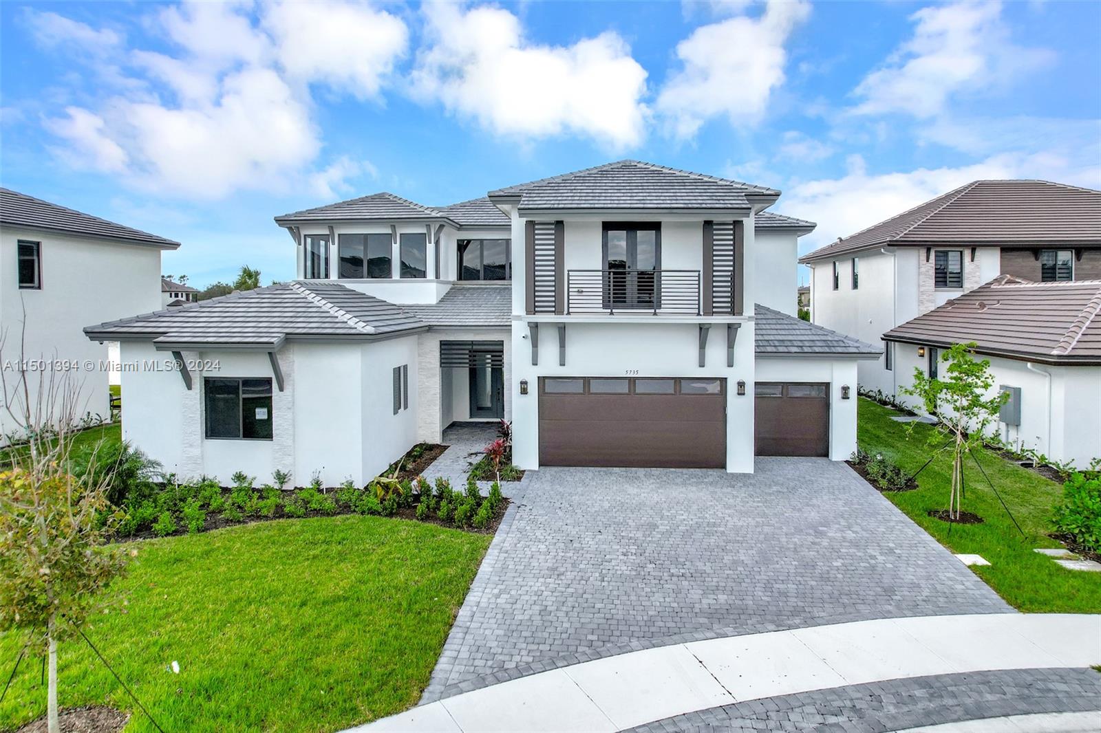Discover the epitome of elegance and modern living in this 6-bedroom, 5-bathroom waterfront home situated on a cul-de-sac. This home offers a host of upscale features including a serene waterfront lot with picturesque views. Inside, enjoy an impressive interior with 11' ceilings, European-style cabinetry and quartz counter tops, adding an air of sophistication. The in-law suite with a private entrance provides independent living space, while 8 security cameras and 35 speakers throughout the home ensure peace of mind and an immersive audio experience.The gated community entrance exudes elegance and prestige. Total sqft: 7,122.