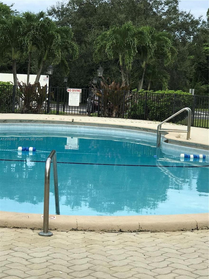 FenceD community in North Miami Beach. Ceramic floors, laundry insiTE. Swimming pool Management on site security $500 to the Association available to move in July 1.