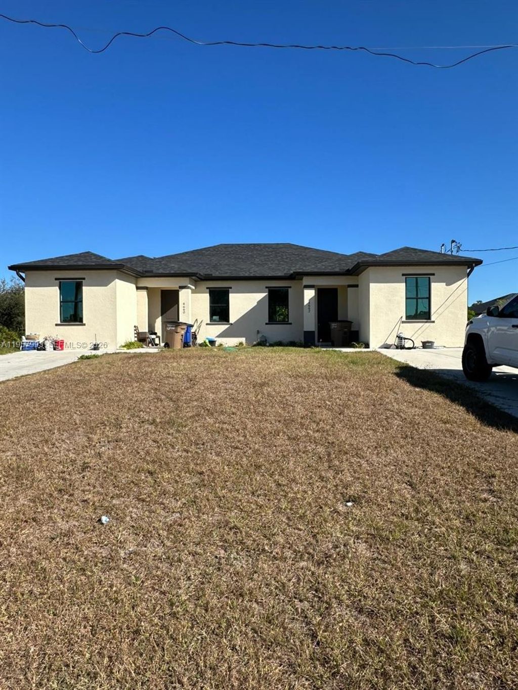 Photo of 4660/4662 SW 26th St, Lehigh Acres, FL 33973 (MLS # A11957993)