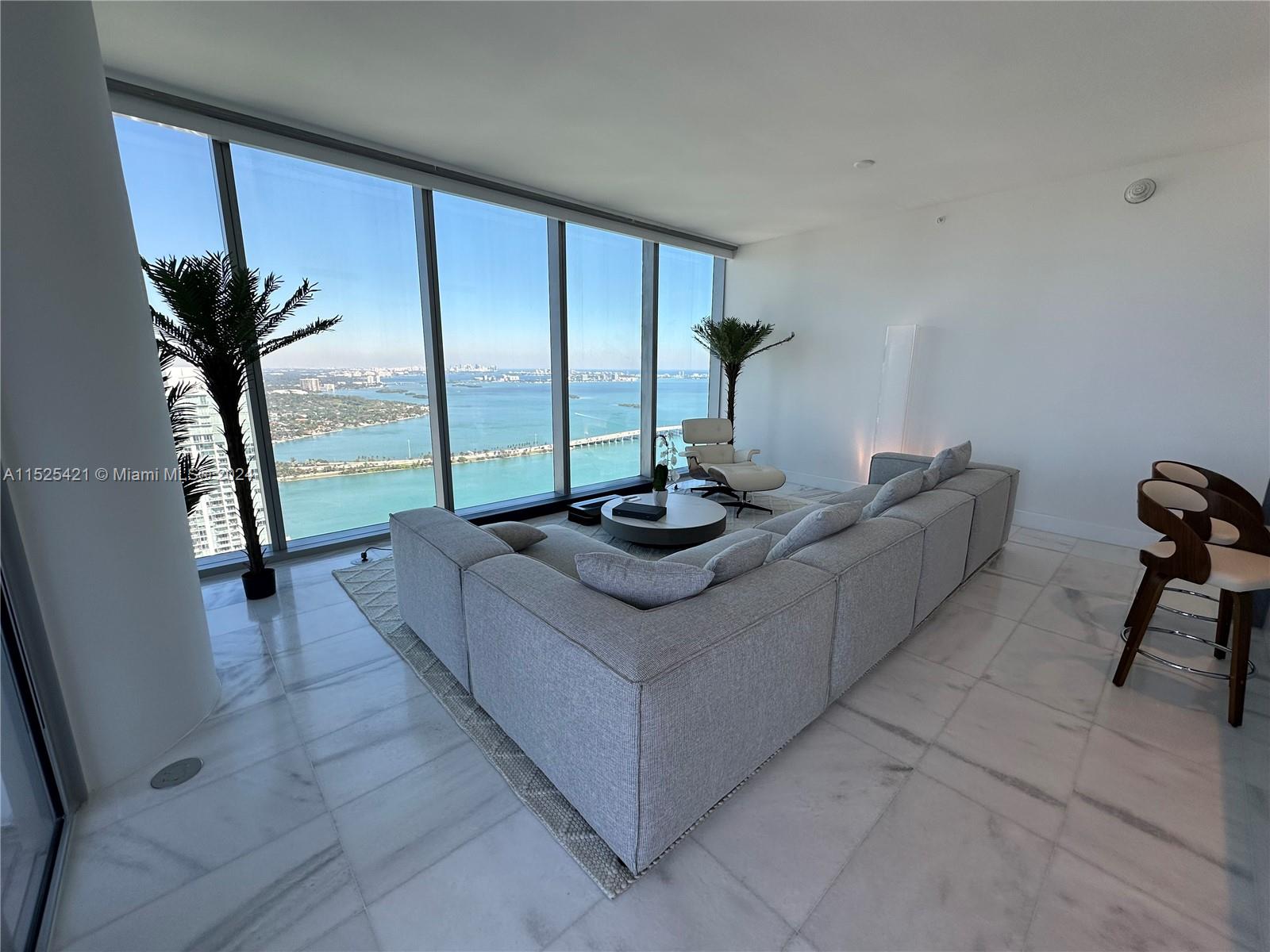 Fully furnished!!! Step into your spot on the 55th floor at Missoni Baia – a 2BR, 2BA condo with breathtaking water and city views. Enjoy the convenience of electric shades and blackouts, along with brand-new closets. Embrace the serene atmosphere with fantastic amenities, including a deck with cabanas, a spacious lap pool, and a lounge with a captivating infinity-edge pool. Don't forget the bonus of a dedicated space for tennis enthusiasts! Stay active in the fitness center, practice yoga, or unwind in the spa and media room. This residence is family-friendly with a playroom and pet-friendly with its own salon. It's not just a home; it's a Missoni Baia lifestyle – simple, comfy, and absolutely cool.