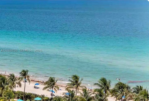 Photo of 4001 S Ocean Dr #14H, Hollywood, FL 33019 (MLS # A12069755)