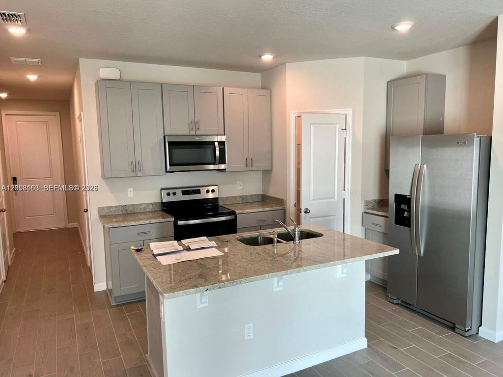 Photo of 5629 Mentmore Dr, Mangonia Park, FL 33407 (MLS # A12008153)