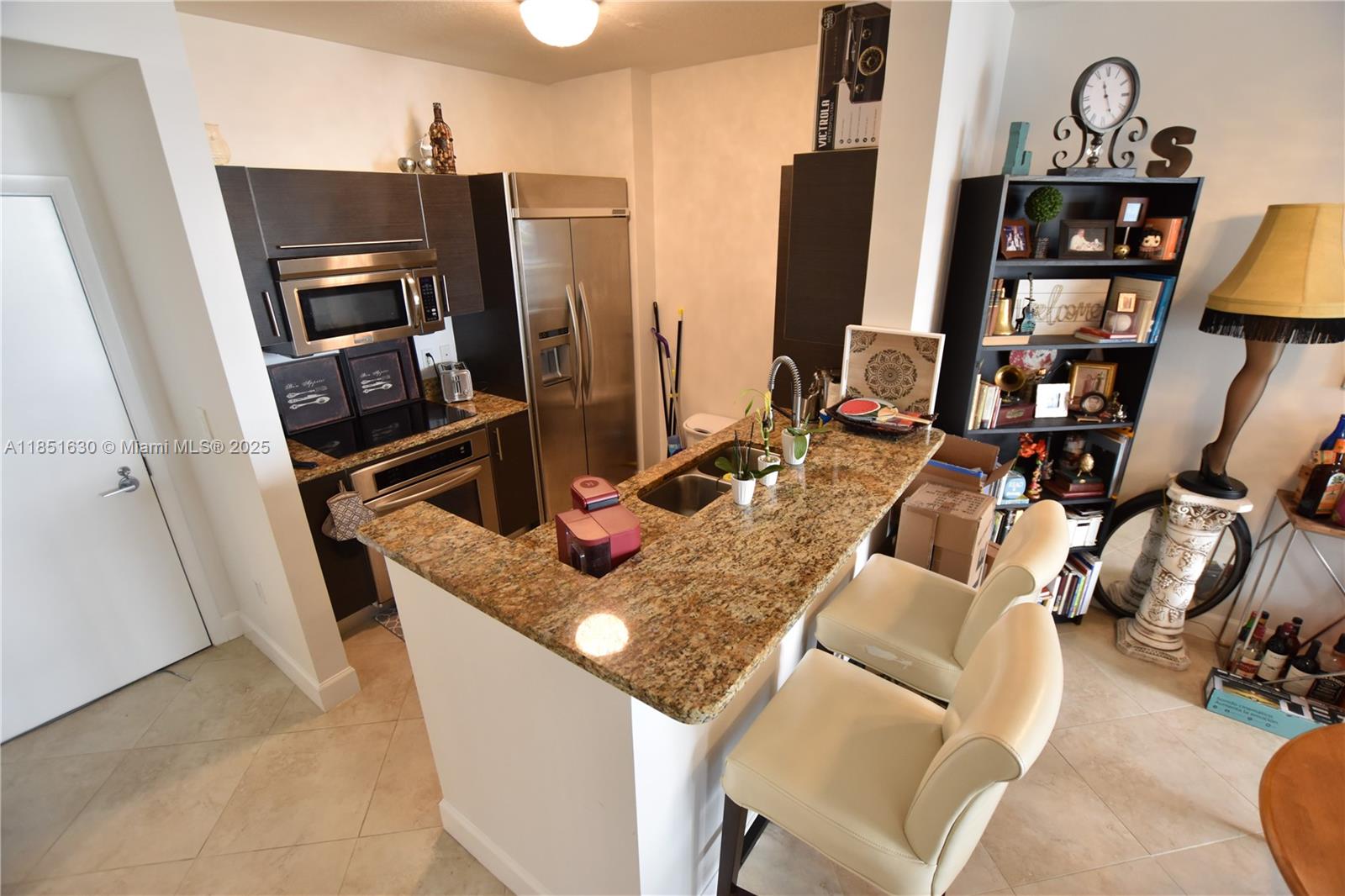 Perfect downtown location with high walkability! This unit offers stunning city views and includes garage parking in space 613. Features 10' ceilings, floor-to-ceiling impact windows in the master bedroom, stainless steel appliances, and granite countertops. Enjoy concierge service, valet parking, and incredible amenities like a sauna, billiards, library, clubhouse with a newly renovated pool, kitchen and bar area, TV, state-of-the-art fitness center, and more. Priced to rent quickly, available 9-15-25.