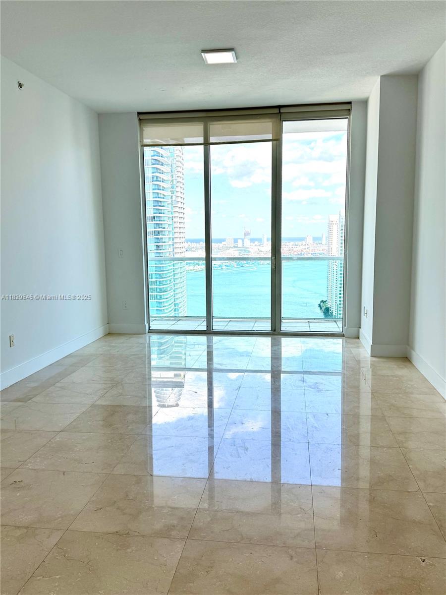 High floor, Stunning 2 br / 2 ba in Brickell. High ceilings and 1,058 sq. ft. of luxurious living space. Enjoy breathtaking views in this desirable condo - Brickell on the River North! Steps to Metro Mover and 2 blocks from City Centre restaurants/shops, walking distance to Mary Brickell Village Shops, financial district and more. Unit comes with one assigned parking space. Modern amenities include 2 Pools, Jacuzzi, Fitness Center, Spa, Concierge, EV charging stations and Valet. Contact us for more info and to schedule a showing! Tenant occupied until end of July 2025.