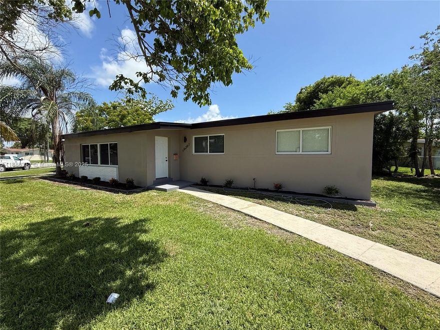 Welcome to this beautifully remodeled 4-bedroom, 2-bathroom home situated on a desirable corner lot! Step inside to find an open and airy floor plan filled with natural light, brand-new vinyl flooring, and fresh interior and exterior paint. The updated kitchen features sleek stainless steel appliances, modern cabinetry, quartz countertops, and a stylish backsplashperfect for cooking and entertaining. Both bathrooms have been completely renovated with contemporary finishes, including designer tile, new vanities, and upgraded fixtures. The generously sized bedrooms offer comfort and versatilityideal for families, guests, or a home office. New roof, new windows ! Don't miss this opportunity .Easy to show