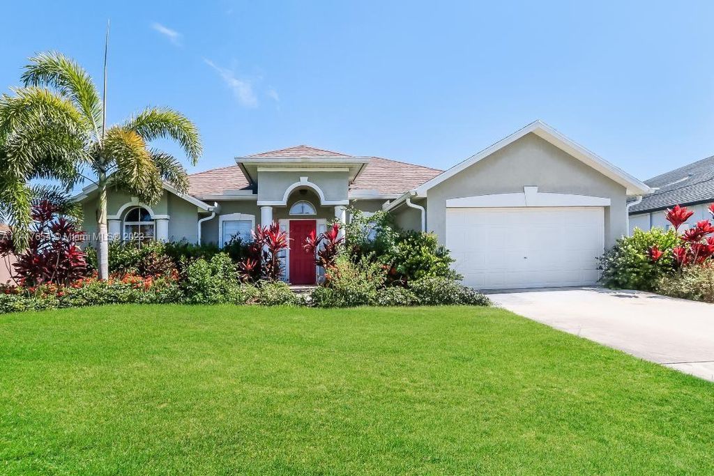 Photo of 1125 SW Gaffney Ave, Port Saint Lucie, FL 34953 (MLS # A11417654)