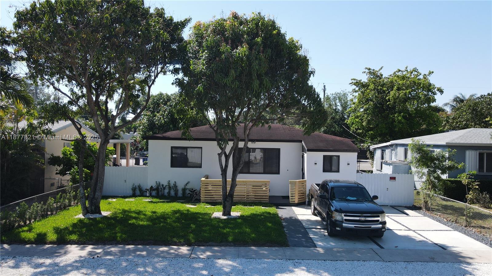 Beautiful home with gorgeous landscaping. The main house is a 3/2 and there is a separate 1/1 studio apartment located in the rear of the property, with its own entrance and parking. The studio apartment can be used to generate additional income as a rental or Airbnb. There is also a nice size laundry room outside in between the main house and studio apartment, that has the option to be shared. There is also enough room to add a pool. This house is centrally located in the heart of North Miami Beach just 2 minutes away from the main expressways (I95, 826, Turnpike, and 441), minutes away from beaches, shops, and restaurants. This is a highly sought after area and will not last long.