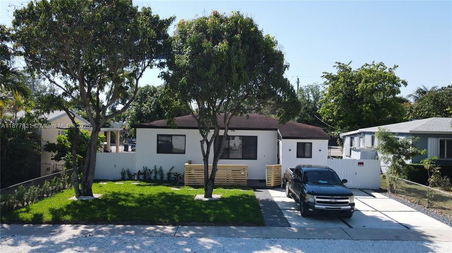Beautiful home with gorgeous landscaping. The main house is a 3/2 and there is a separate 1/1 studio apartment located in the rear of the property, with its own entrance and parking. The studio apartment can be used to generate additional income as a rental or Airbnb. There is also a nice size laundry room outside in between the main house and studio apartment, that has the option to be shared. There is also enough room to add a pool. This house is centrally located in the heart of North Miami Beach just 2 minutes away from the main expressways (I95, 826, Turnpike, and 441), minutes away from beaches, shops, and restaurants. This is a highly sought after area and will not last long.
