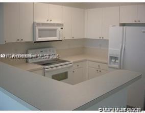 Spacious One-Bedroom Condo with Brand New Wood Floors, conveniently located in the Heart of Coral Gables!!! Right of of Miracle Mile in Walking Distance to Shops, Resturants, Banks, Downtown Coral Gables, and Entertainment. Minutes from the University of Miami. Modern, Full Amenities Building. Beautiful Pool, 24/7 Security and Concierge. Jacuzzy,Business Center, Clubroom, Gym. Balcony and Washer and Dryer in Unit. Very Nice Area and Building to Live in. Tenant Occupied through February 13th, 2025.