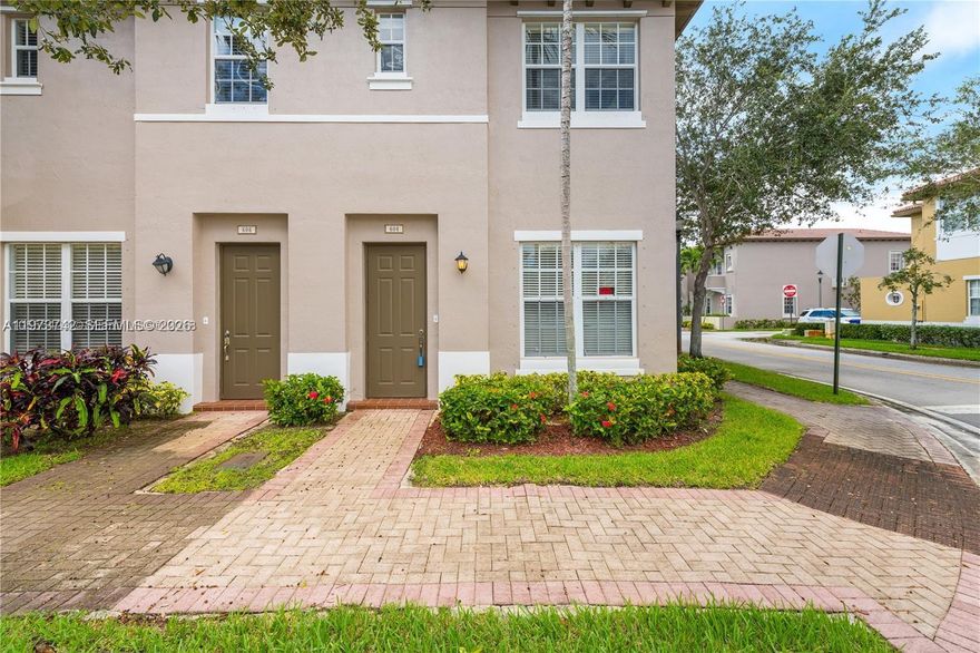 Spacious and bright two story townhouse. Corner unit with extra windows for more light. 3 bedroom/2.5 bath with lots of upgrades. New tiles through out main floor. New laminated floors on stairs and second floor. Painted in neutral color. Upgraded kitchen with stainless steel, granite counter tops and backsplash. Two private parking spaces from back entrance. Enjoy living in prestigious cobblestone community with 24 hour guard gate, great clubhouse, resort-style community poo, gym, and tot lot area. convenient location, right on the corner of I-75 and pines Blvd. Walking distance to shopping areas, banks and restaurants.