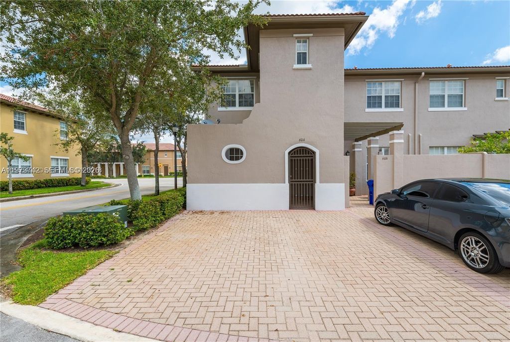 Photo of 604 SW 147th Ave #1-37, Pembroke Pines, FL 33027 (MLS # A11973742)