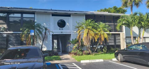 Photo of 819 NE 199th St #6-101, Miami, FL 33179 (MLS # A12044691)