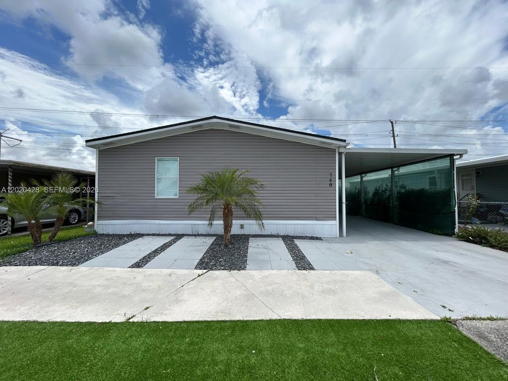Photo of 740 NW 219th Ave #1, Pembroke Pines, FL 33029 (MLS # A12020428)