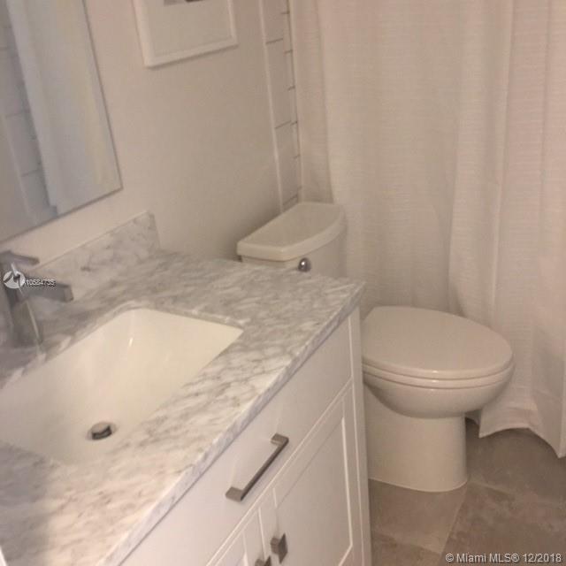 QUADOMAIN TOWER IV CONDO - Residential Lease