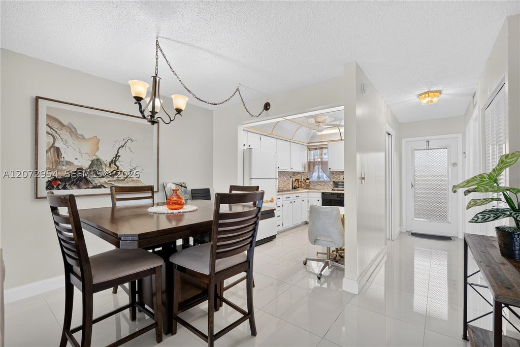 Photo of 8900 Washington Blvd #409, Pembroke Pines, FL 33025 (MLS # A12072954)