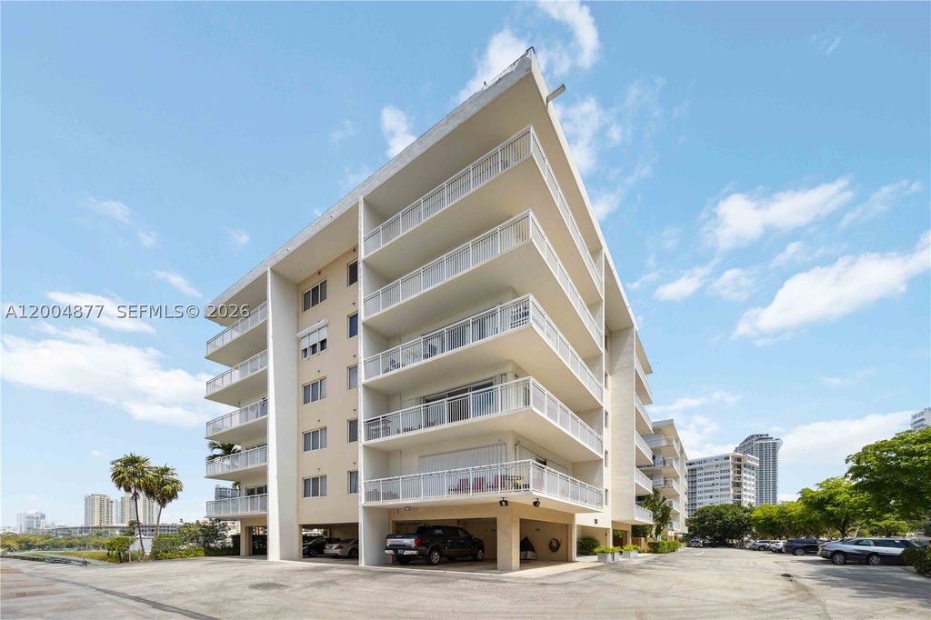 Photo of 126 Golden Isles Dr #32A, Hallandale Beach, FL 33009 (MLS # A12004877)