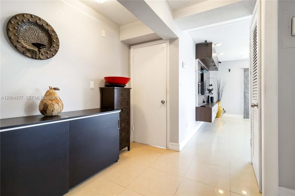 Photo of 126 Golden Isles Dr #32A, Hallandale Beach, FL 33009 (MLS # A12004877)