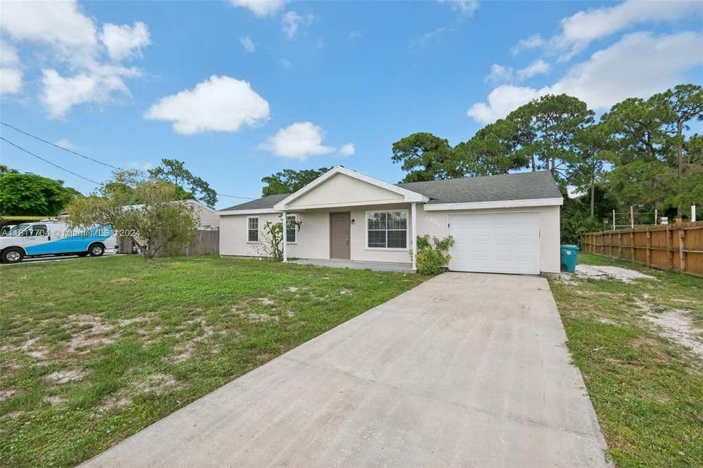 Photo of 1951 SE Aneci St, Port Saint Lucie, FL 34983 (MLS # A11617704)