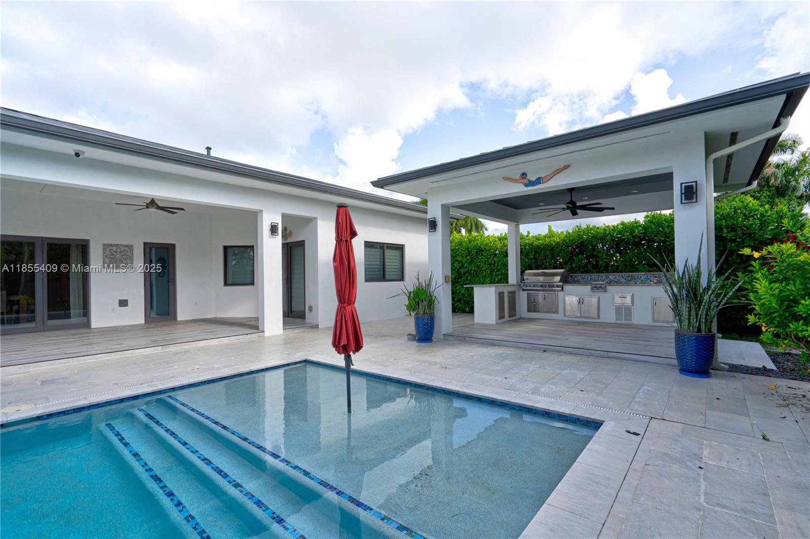 Luxurious Annual Rental. Come RELAX & REJUVENATE in this custom built home w/3,179 Sq. Ft. of living space, with additional 225 Sq. Ft. Cabana on a corner lot cul-de-sac private street. Open Floor plan with all top of the line finishes. Enjoy the 37'x15' pool, a 15x15 cabana with a built in kitchen/Grill, High Impact windows, plantation Shutters, Metal Roof, LED Lighting. Too many Features and Top of the line Systems/Upgrades to List.