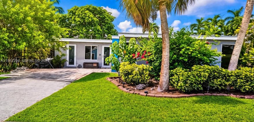 Experience privacy and modern living in this exceptional waterfront retreat at the end of a quiet cul-de-sac. Enjoy serene water views and direct access from your private dock—great for boating, fishing, or relaxing by the water.

The home features over $162K in renovations from roof to floor, including a new roof, impact windows and doors, and fully renovated bathrooms, kitchen, living room, and bedrooms. It also includes a fully integrated voice-activated intelligent home system featuring color lighting, home audio, Nest thermostat & smoke detectors, automated blinds, and security cameras for convenience and peace of mind.

Located just minutes from the beach, Hard Rock Casino, and Hard Rock Stadium, this property is ready for Airbnb, offering both lifestyle and investment potential.