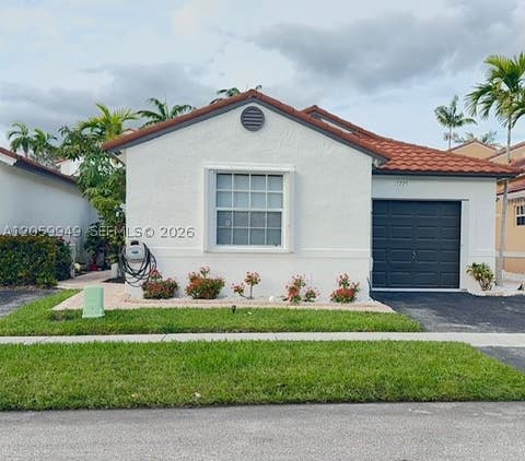 Photo of 17225 NW 7th St, Pembroke Pines, FL 33029 (MLS # A12059949)