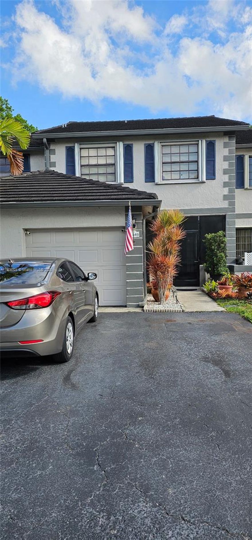 Beautiful, spacious, well-maintained, and remodeled townhouse in the heart of Hammocks. It features 3 bedrooms and 2.5 bathrooms, with an excellent, relaxing view from the patio. Don't miss the opportunity to own a gem like this. This property is in a desirable location near restaurants, supermarkets, convenience stores, and numerous recreational spaces for picnics. It also has a garage and two additional parking spaces. This property features a cool patio with spectacular views, surrounded by trees. It also has excellent schools and easy access to public transportation. La Maison association have a pool  with a club house. The hammocks amenities includes 11 miles trail, lake beaches, pools, courts, basketball courts, playgrounds. House has a recently updated roof, a/c and Water heater.
