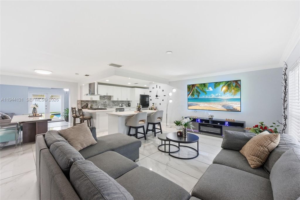 Photo of 9771 NW 24th Pl, Sunrise, FL 33322 (MLS # A11944131)