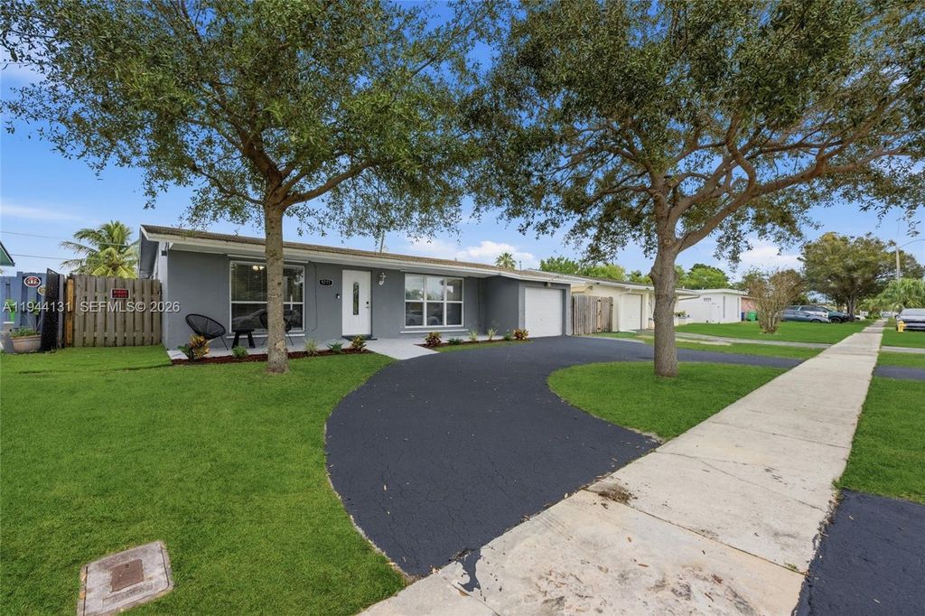 Photo of 9771 NW 24th Pl, Sunrise, FL 33322 (MLS # A11944131)