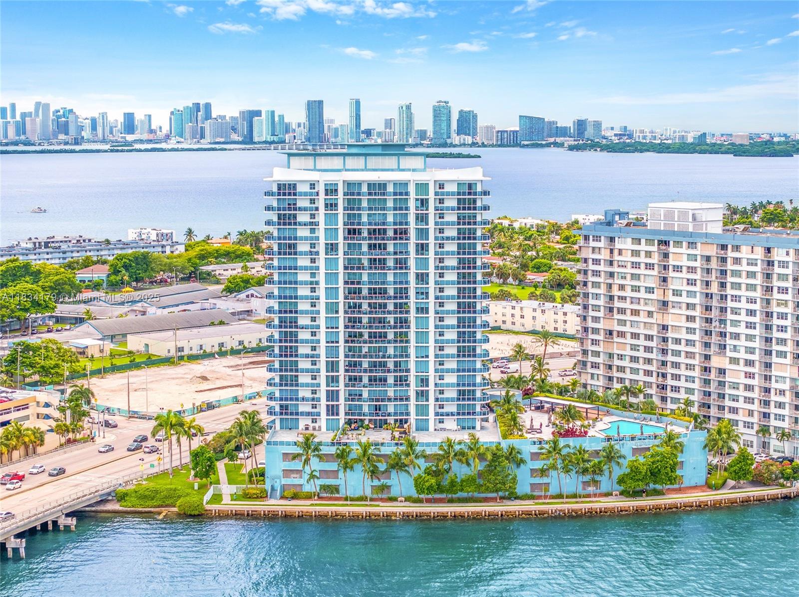Beautifully updated 2 bed / 2 bath condo with a split floor plan and stunning water and Downtown views. This spacious residence features tile flooring throughout, a built-out walk-in closet in the primary suite, smart AC thermostat, and automatic shades in every room—with blackout shades in the bedrooms. The full-size laundry room includes washer and dryer for added convenience. Enjoy resort-style amenities including a newly remodeled pool, jacuzzi, BBQ areas, gym, party room, and 24/7 front desk in a secured building. Unbeatable location—just 15 minutes from Brickell, Wynwood, Miami Beach, and more! Quick condo association approval, available for immediate move in.