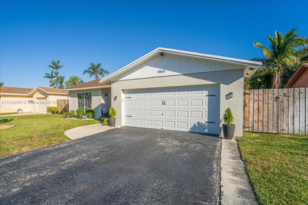 Photo of 9841 NW 24th St, Coral Springs, FL 33065 (MLS # A11539069)