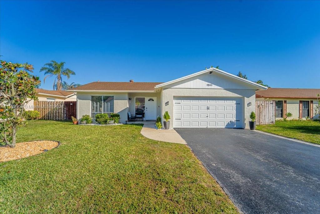 Photo of 9841 NW 24th St, Coral Springs, FL 33065 (MLS # A11539069)