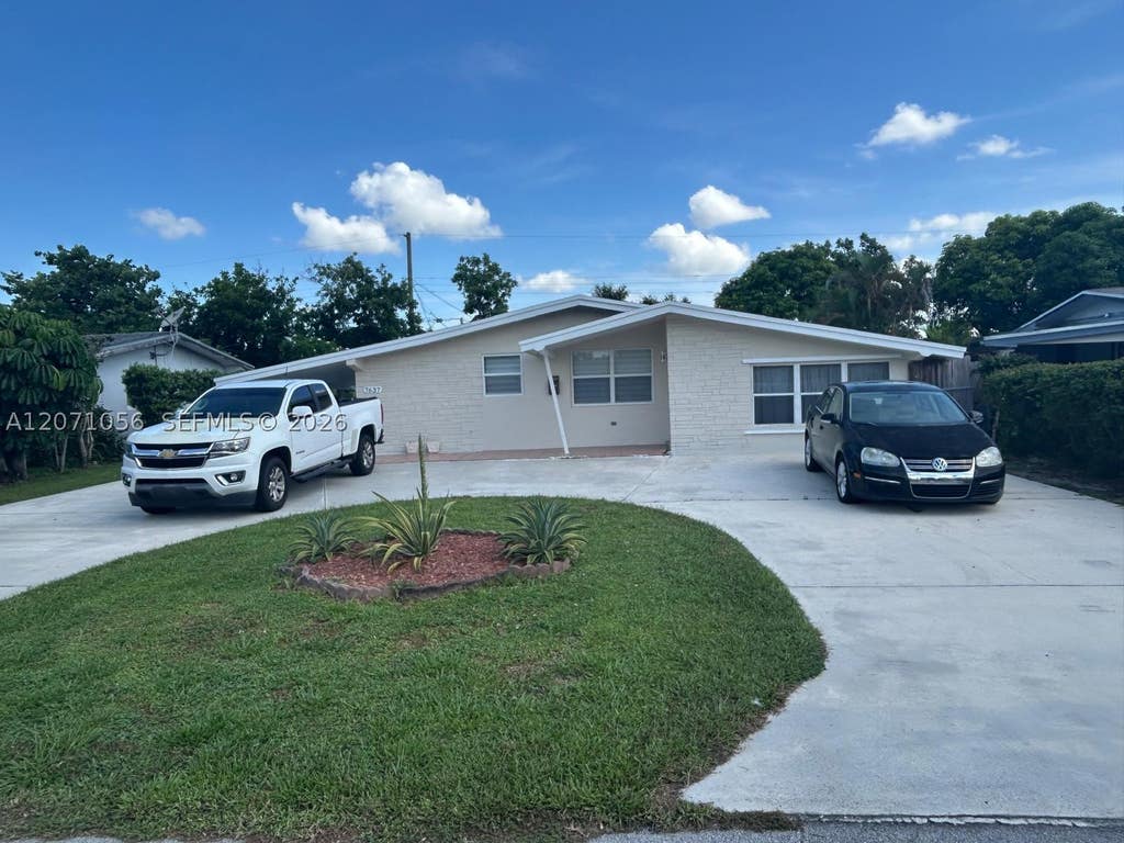 Photo of 7637 Ramona St, Miramar, FL 33023 (MLS # A12071056)