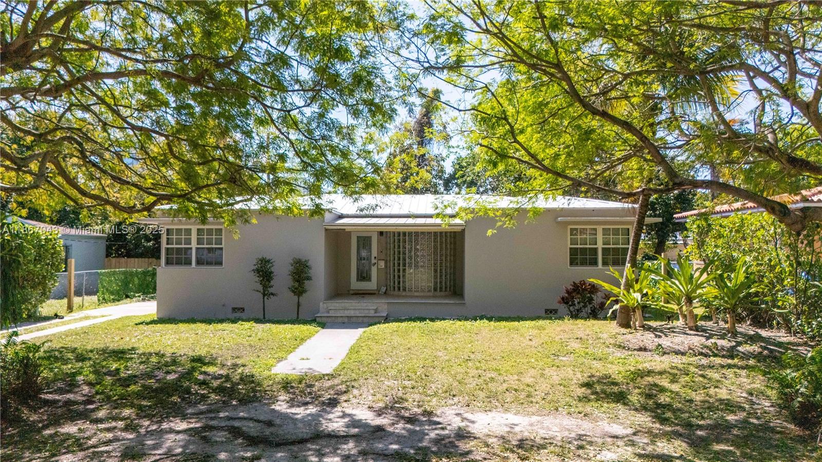 Discover comfort and style in this fully furnished 4BR, 2BA single-family home just minutes from Miami’s Design District, Midtown, and Wynwood. This renovated gem features a bright split floor plan, refinished hardwood floors, and updated systems including a new AC, PVC plumbing, electrical panel, and 40-year metal roof. Ideal for families or roommates with 2BR/1BA on each side of the home. Enjoy a private yard with space to park a boat or RV. Walk to top-rated restaurants, shops, and enjoy quick access to I-95. Only 15 mins to Brickell and Miami Beach.