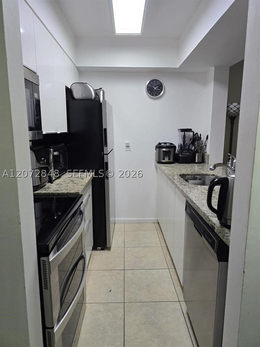 Photo of 10001 W Atlantic Blvd #119, Coral Springs, FL 33071 (MLS # A12072848)