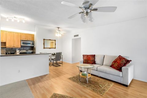 Photo of 10715 W Clairmont Cir #212, Tamarac, FL 33321 (MLS # A11973317)